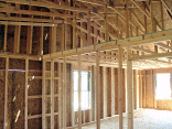 With the roof on you can see the 12 foot cathedral ceiling and plant shelf in the master suite.