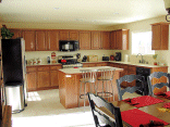 View of the kitchen with the new cabinet pulls.