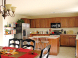 View of the kitchen showing the new shelves.