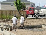 The concrete starts to pour.