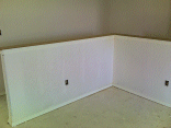 The half wall cap at the top of the stairs.
